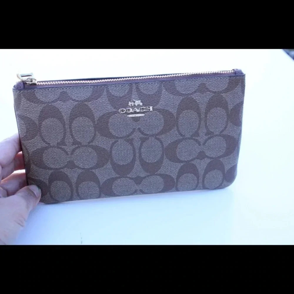 Coach signature logo cluth